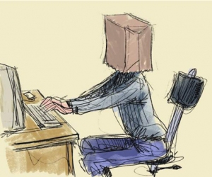 [Image: bag-over-head-behind-desk.jpg]